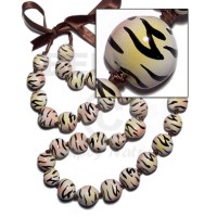 Kukui seeds in animal print