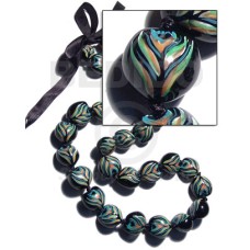 Kukui seeds in animal print Kukui seeds in animal print