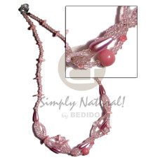 Pink glass beads intertwined glass Pink glass beads intertwined glass