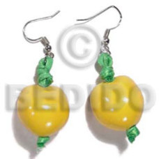 Dangling yellow kukui nuts Dangling yellow kukui nuts