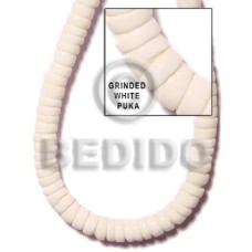 Grinded white puka shell class Grinded white puka shell class