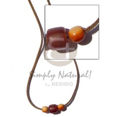 Leather thong horn cylinder Leather thong horn cylinder