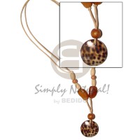 Round cowrie shell pendant