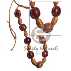 Capsule wrapped wood beads Capsule wrapped wood beads